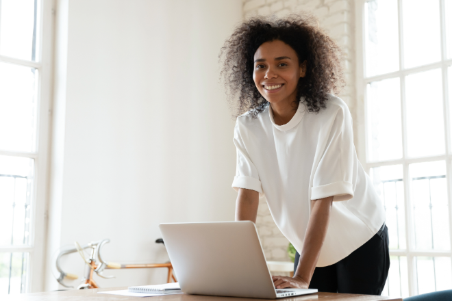 woman with laptop at desk